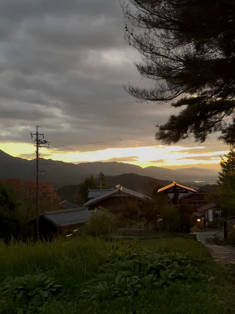 The mountains at dusk from the top of Magome, the post town’s roofs catching the last of the light